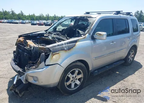 2010 Honda Pilot Touring z USA, uszkodzony, nr VIN 5FNYF4H94AB010058